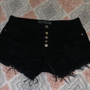 Distressed black shorts